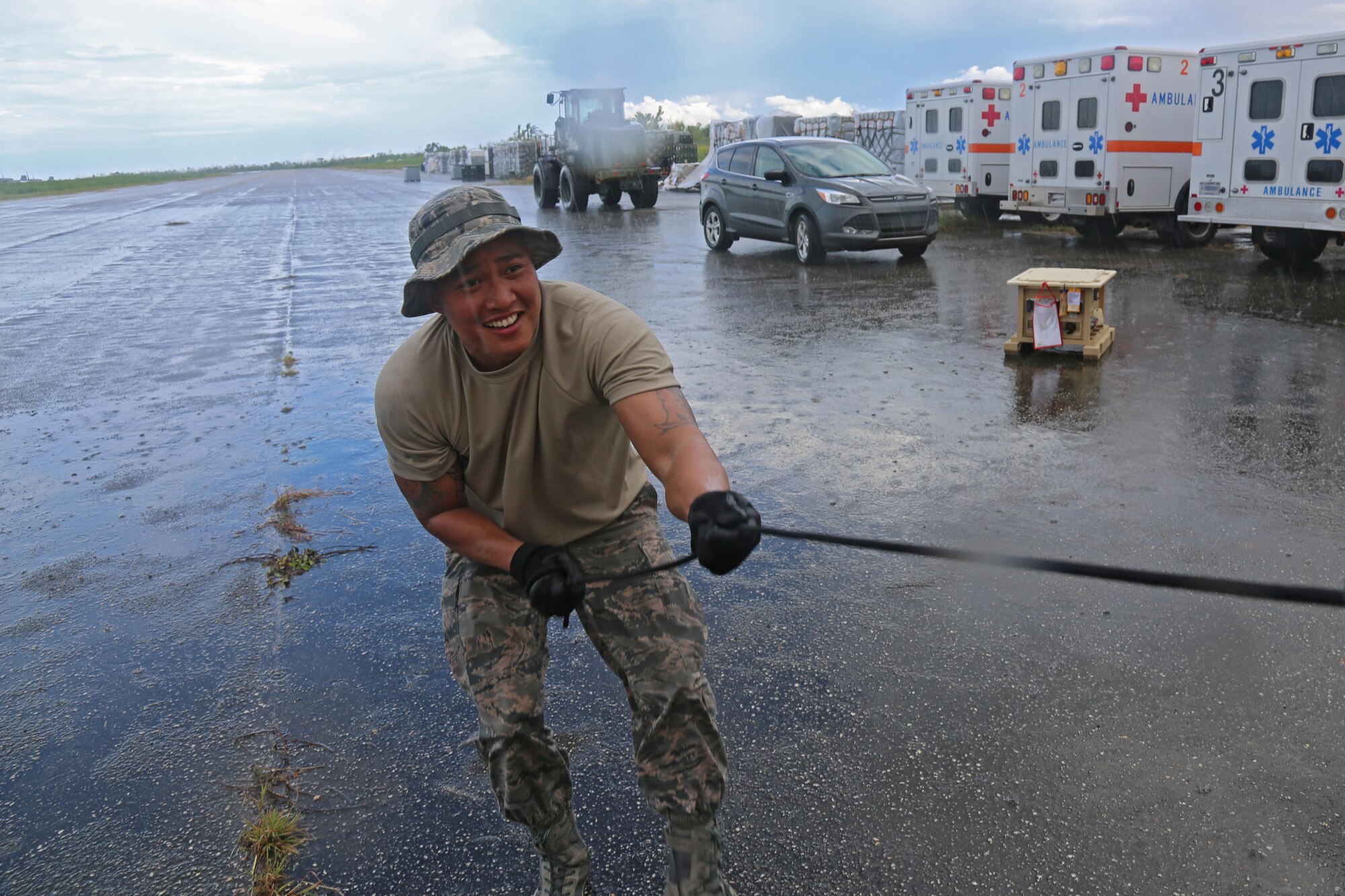 An U.S. Air Force Airman assigned to 633rd Medical Group, assembles medical tents, Aguadilla, Puerto Rico, Oct. 16, 2017. The 633rd Medical Group is conducting medical evacuation and relief efforts to support FEMA in the recovery process of Puerto Rico after the devastation created by Hurricane Maria. (U.S. Army photo by Sgt. Nelson Rodriguez)