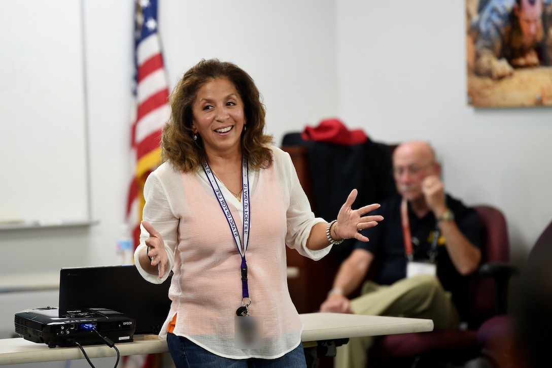Carmella Navarro, Suicide Prevention Program Manager, 85th Support Command, shares concluding remarks during a five-day Applied Suicide Intervention Skills Training (Training for Trainers) workshop, October 20, 2017.