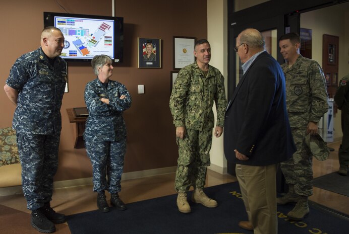 Goose Creek Mayor Michael Heitzler speaks to Joint Base Charleston leadership during a joint base mission briefing inside the clinic here, Oct. 25, 2017.