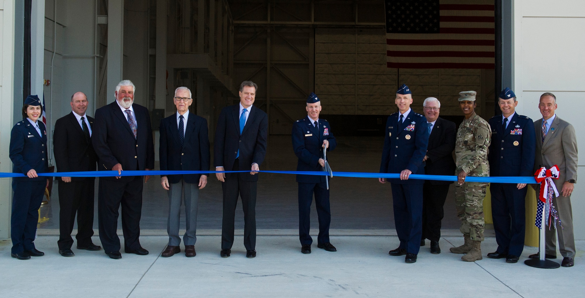 Col. Sean P. Larkin, National Air and Space Intelligence Center commander, and key leaders cuts a ribbon to celebrate the completion of the new foreign materiel exploitation facility here, Oct. 20, 2017.