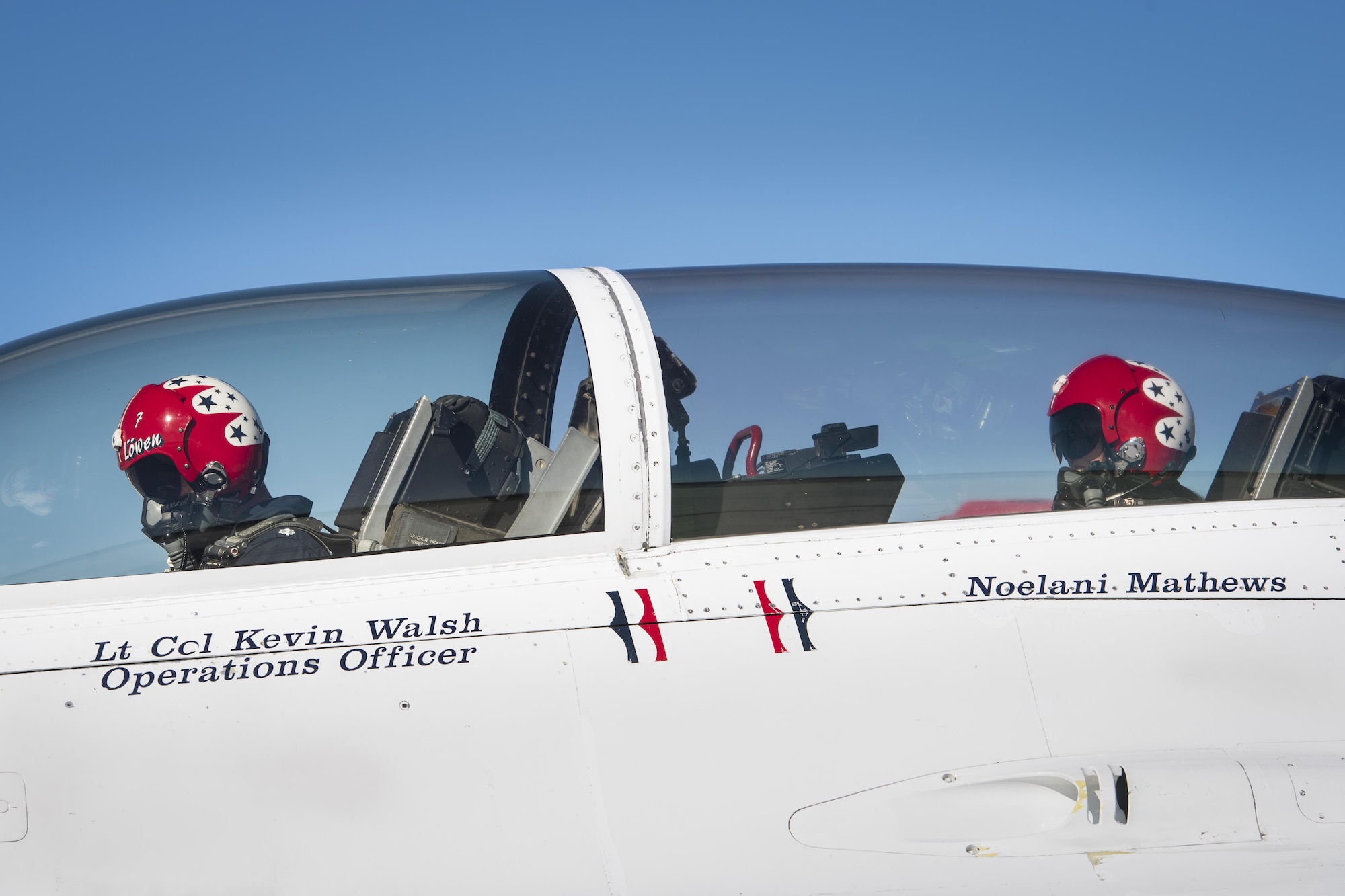 Noelani Mathews, multimedia journalist, and Lt. Col. Kevin Walsh, U.S. Air Force Thunderbird pilot No. 7, sit in the cockpit before her media flight in an F-16D Fighting Falcon, Oct. 27, 2017, at Moody Air Force Base, Ga. The Thunderbirds, based out of Nellis Air Force Base, Nev., are the Air Force’s premier aerial demonstration team, performing at air shows and special events worldwide. (U.S. Air Force photo by Senior Airman Janiqua P. Robinson)