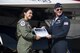 Noelani Mathews, multimedia journalist, and Lt. Col. Kevin Walsh, U.S. Air Force Thunderbird pilot No. 7, pose with her flight certificate after her media flight in an F-16D Fighting Falcon, Oct. 27, 2017, at Moody Air Force Base, Ga. The Thunderbirds, based out of Nellis Air Force Base, Nev., are the Air Force’s premier aerial demonstration team, performing at air shows and special events worldwide. (U.S. Air Force photo by Senior Airman Janiqua P. Robinson)