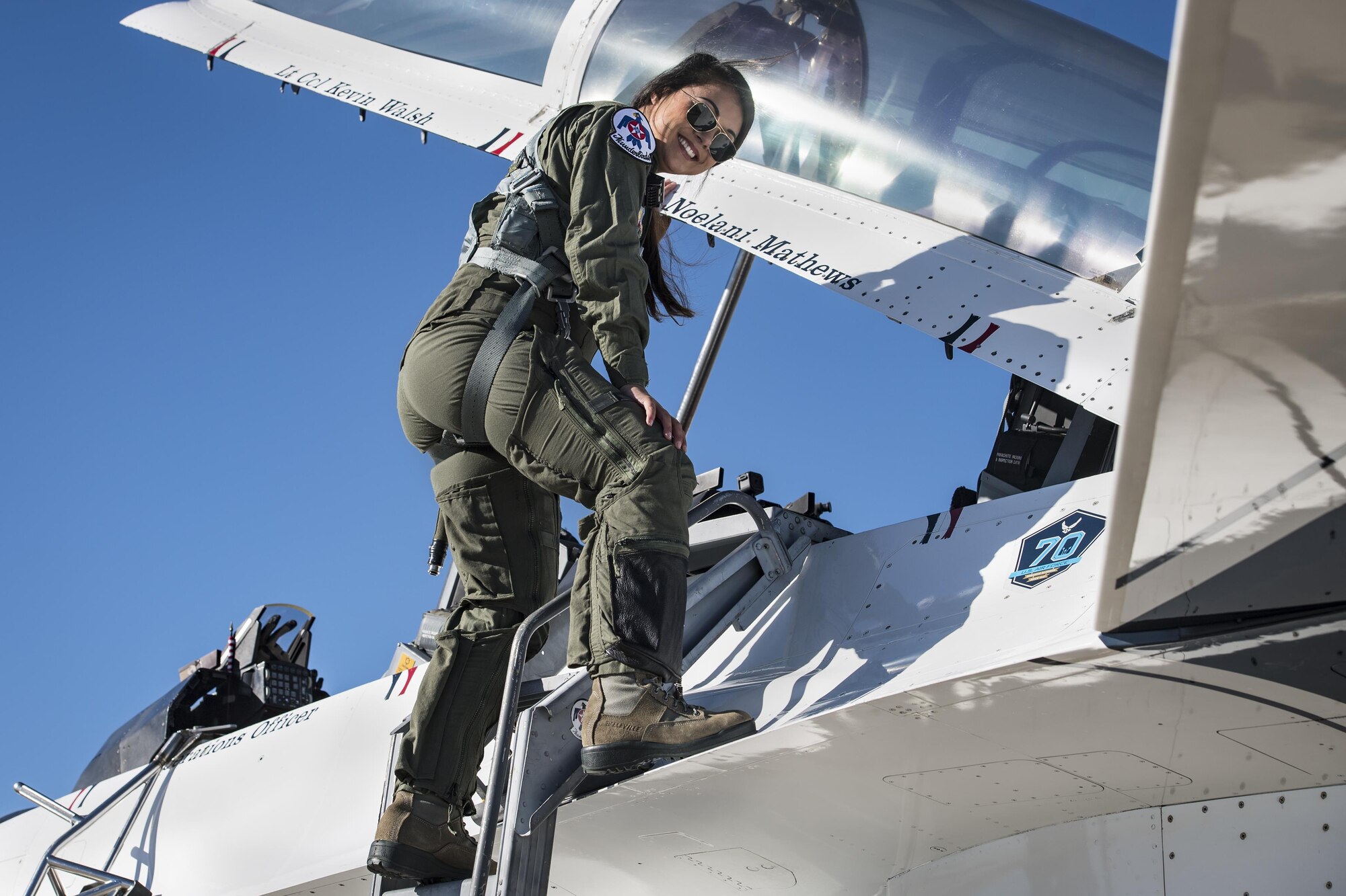 Noelani Mathews, multimedia journalist, poses before her media flight in an F-16D Fighting Falcon, Oct. 27, 2017, at Moody Air Force Base, Ga. The U.S. Air Force Thunderbirds, based out of Nellis Air Force Base, Nev., are the Air Force’s premier aerial demonstration team, performing at air shows and special events worldwide. (U.S. Air Force photo by Senior Airman Janiqua P. Robinson)