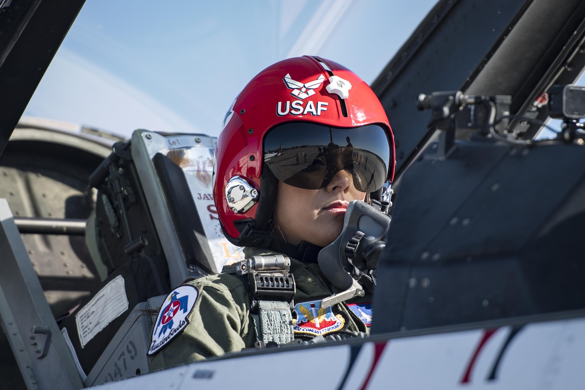 Noelani Mathews, multimedia journalist, sits in the cockpit of an F-16D Fighting Falcon before her media flight, , Oct. 27, 2017, at Moody Air Force Base, Ga. The U.S. Air Force Thunderbirds, based out of Nellis Air Force Base, Nev., are the Air Force’s premier aerial demonstration team, performing at air shows and special events worldwide. (U.S. Air Force photo by Senior Airman Janiqua P. Robinson)
