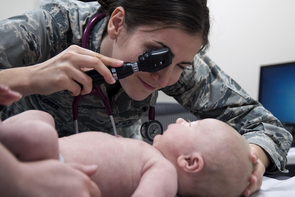 Capt. Kelsey Pilcher, 48th Medical Group pediatric nurse practitioner, listens to a newborn’s heartbeat during a check‐up at Royal Air Force Lakenheath, England, Oct. 24. Recently, during a check‐up with one of her patients, Pilcher spoke up when she noticed that the lab test results differed from what she observed during her examination. (U.S. Air Force photo/Senior Airman Malcolm Mayfield)