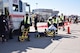 First responders coordinate to assist passengers of an aircraft accident during the 2017 Triennial Exercise here, Oct. 26, 2017. The exercise is a three-year requirement of the Federal Aviation Administration. (U.S. Air Force photo by 2nd Lt. Tinashe Machona)