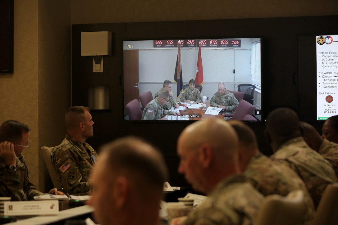 Army Reserve Brig. Gen. Kris Belanger, Commanding General, 85th Support Command, center, gives opening remarks via a video teleconference to First Army brigade command teams during the 85th Support Command’s New Brigade Command Teams Orientation brief at Rock Island Arsenal, Illinois, October 22, 2017.