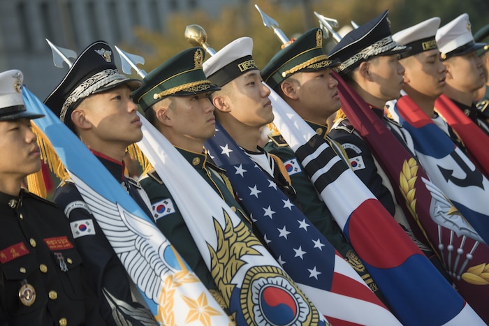 An honor guard preps for the arrival of Marine Corps Gen. Joe Dunford.