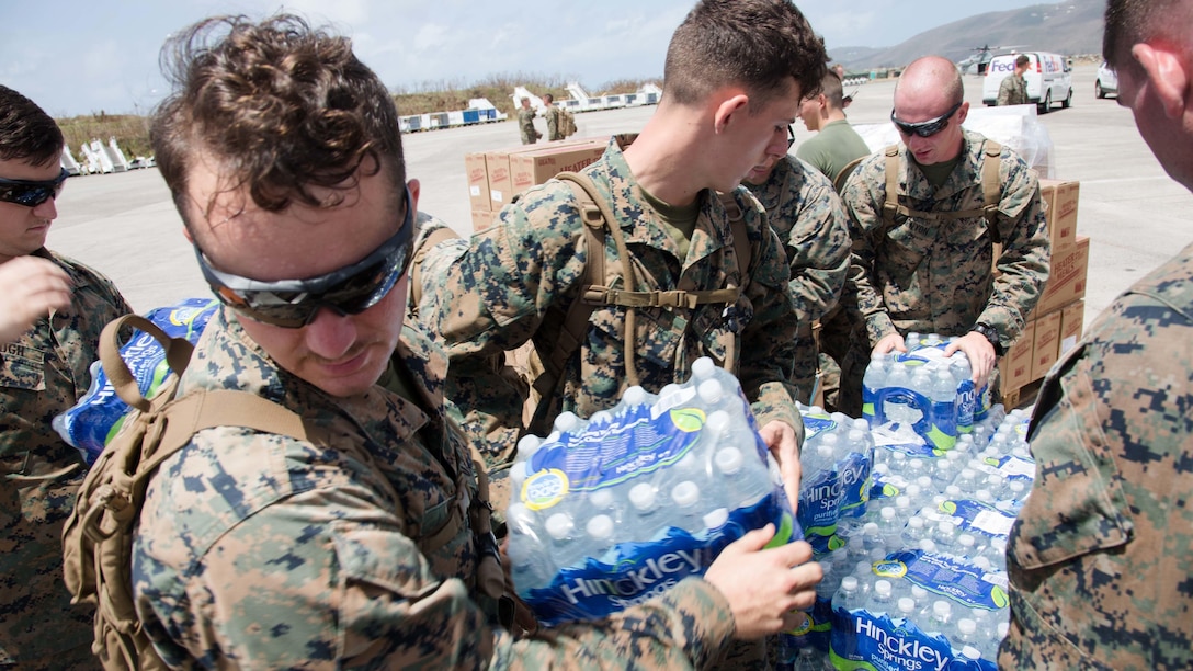 U.S. Marines with the 26th Marine Expeditionary Unit (MEU), unload emergency care items at the St. Thomas Cyril E. King Airport, U.S. Virgin Islands, Sept. 12, 2017. The 26th MEU worked jointly with Department of Defense services and Federal Emergency Management Agency staff to provide food, water, and other essential care items in support of Hurricane Irma relief efforts.