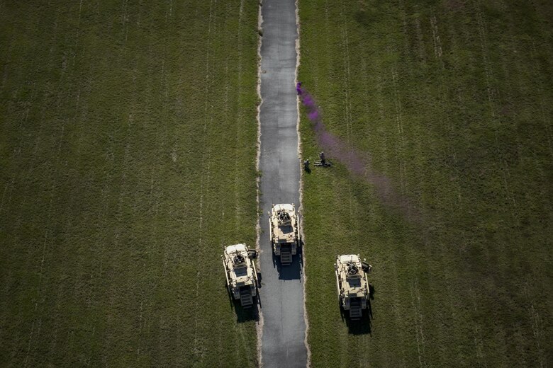 Pararescuemen from the 38th Rescue Squadron wait for pickup alongside defenders from the 820th Base Defense Group during the Thunder Over South Georgia Air Show, Oct. 28, 2017, at Moody Air Force Base, Ga. The open house is an opportunity for Moody to thank the local community for all its support, and exhibit air power and it included aerial performances, food, face painting and much more. (U.S. Air Force photo by Staff Sgt. Ryan Callaghan)