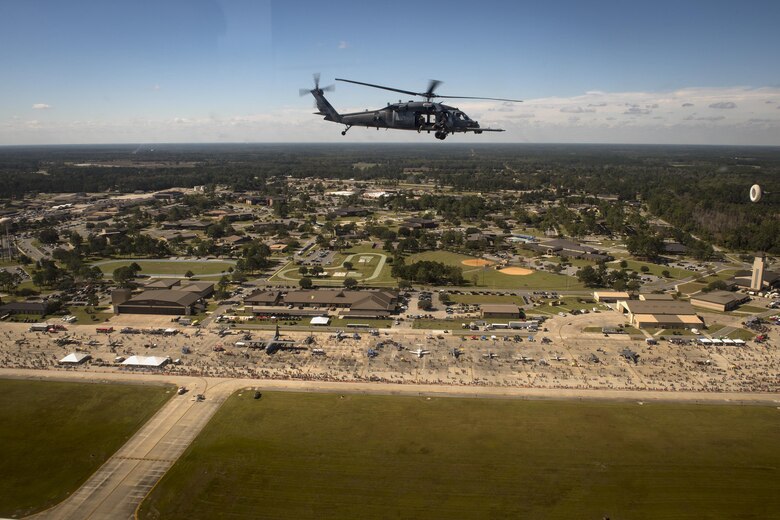 An HH-60G Pave Hawk from the 41st Rescue Squadron flies in front of the crowd during the Thunder Over South Georgia Air Show, Oct. 28, 2017, at Moody Air Force Base, Ga. The open house is an opportunity for Moody to thank the local community for all its support, and exhibit air power and it included aerial performances, food, face painting and much more. (U.S. Air Force photo by Staff Sgt. Ryan Callaghan) (U.S. Air Force photo by Staff Sgt. Ryan Callaghan)