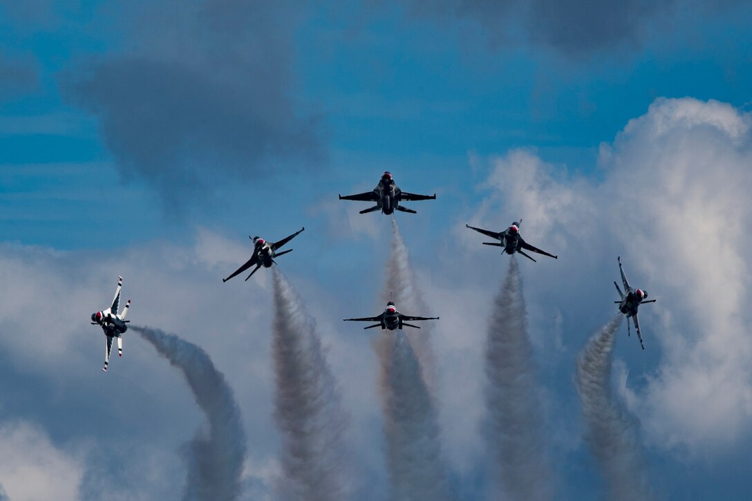 The U.S. Air Force Thunderbirds Flight Demonstration Team soars above Moody Air Force Base during the Thunder Over South Georgia Air Show, Oct. 28, 2017. The Thunderbirds performed twists, turns and rolls at high speeds demonstrating the prowess and capabilities of the F-16 Fighting Falcon. (U.S. Air Force photo by Senior Airman Daniel Snider)