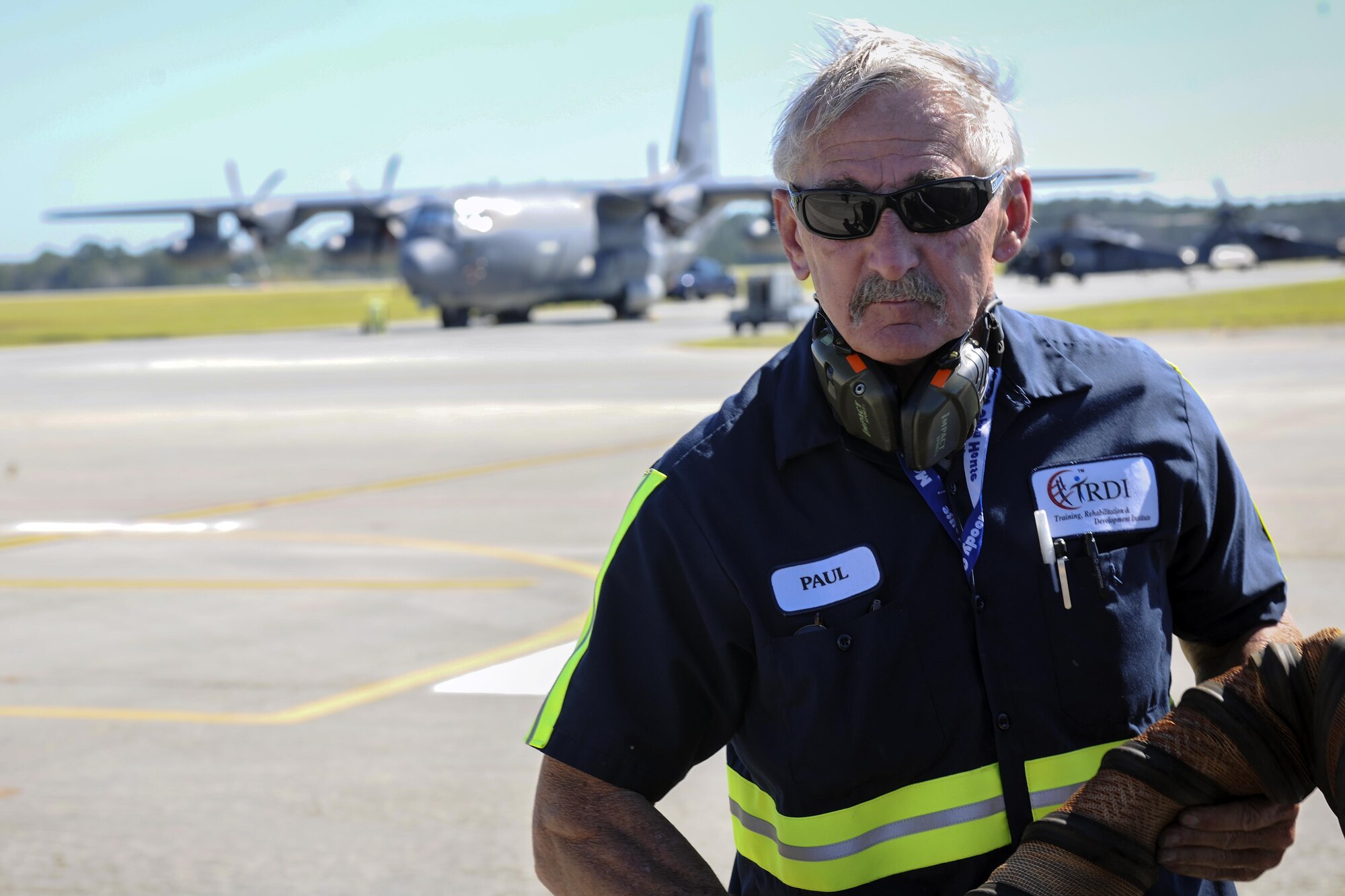Paul Dunning, Training Rehab and Development Institute Crew Chief, rolls up a gas hose during the Thunder over South Georgia air show, Oct. 28, 2017 at Moody Air Force Base, Ga. Moody opened its gates to the public for a free, two-day event as a way to thank the local community for their ongoing support of the base’s mission.  (U.S. Air Force photo by Airman Eugene Oliver)