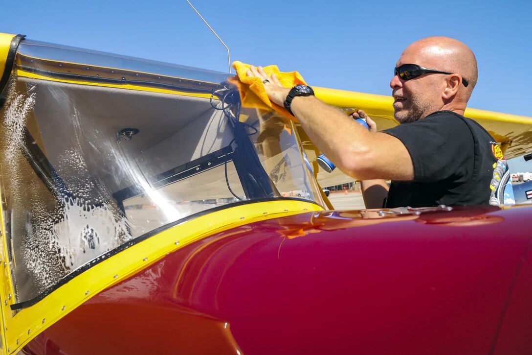 Greg Leach, Interstate Cadet Jelly Belly crew chief, wipes off a windshield during the Thunder Over South Georgia Air Show, Oct. 28, 2017 at Moody Air Force Base, Ga. Moody opened its gates to the public for a free, two-day event as a way to thank the local community for their ongoing support of the base’s mission. (U.S. Air Force photo by Airman Eugene Oliver)