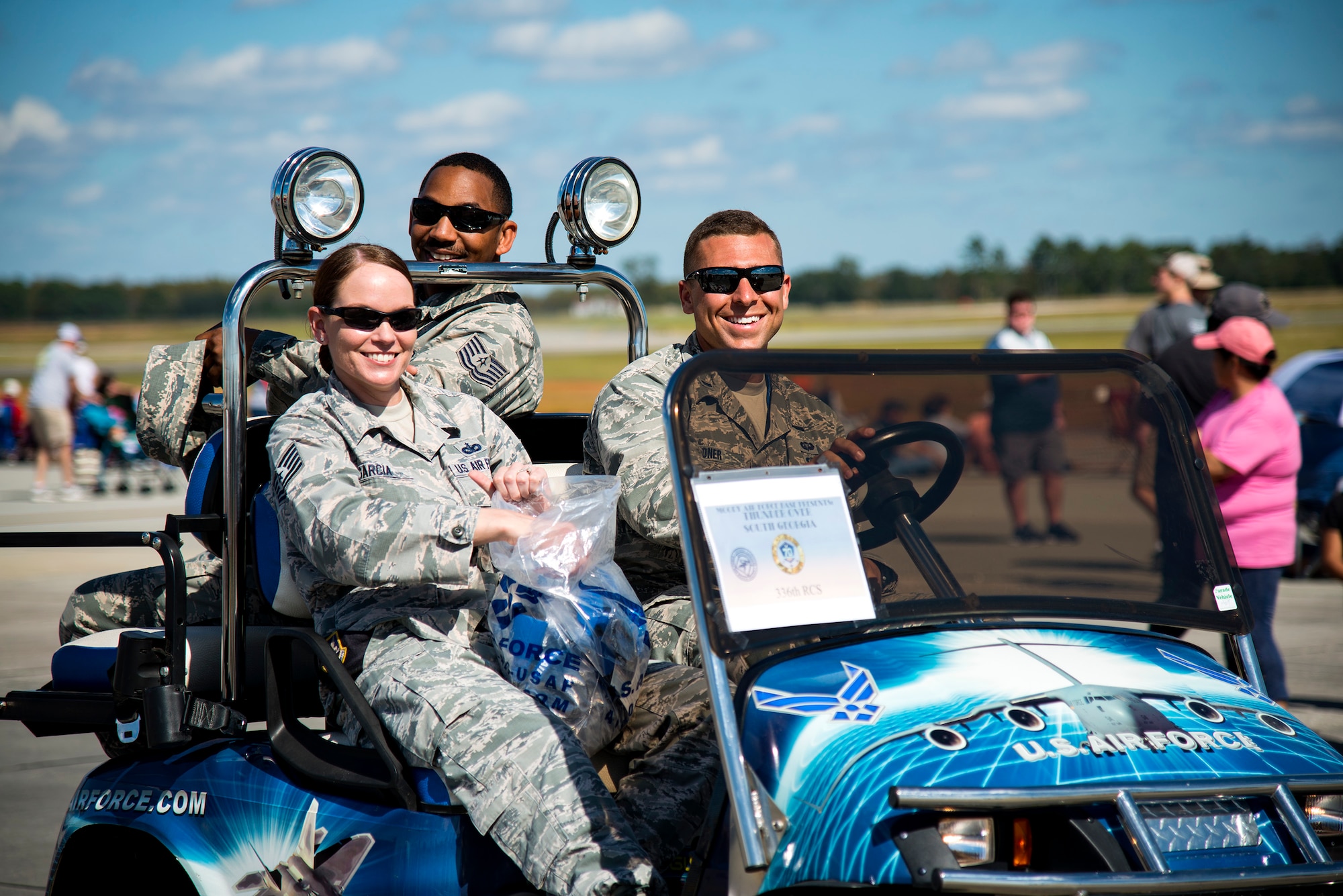 Airmen from the 336th Recruiting Squadron pose for a photo during the Thunder Over South Georgia Air Show, Oct. 28, 2017, at Moody Air Force Base, Ga. The air show is an opportunity for Moody to thank the local community for all its support, and exhibit air power. (U.S. Air Force photo by Airman 1st Class Erick Requadt)