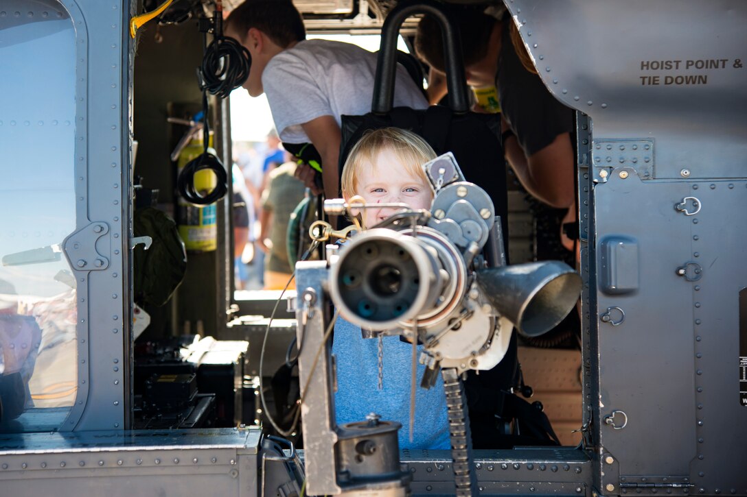 A spectator poses for a photo during the Thunder Over South Georgia Air Show, Oct. 28, at Moody Air Force Base, Ga. The air show is an opportunity for Moody to thank the local community for all its support, and exhibit air power. (U.S. Air Force photo by Airman 1st Class Erick Requadt)