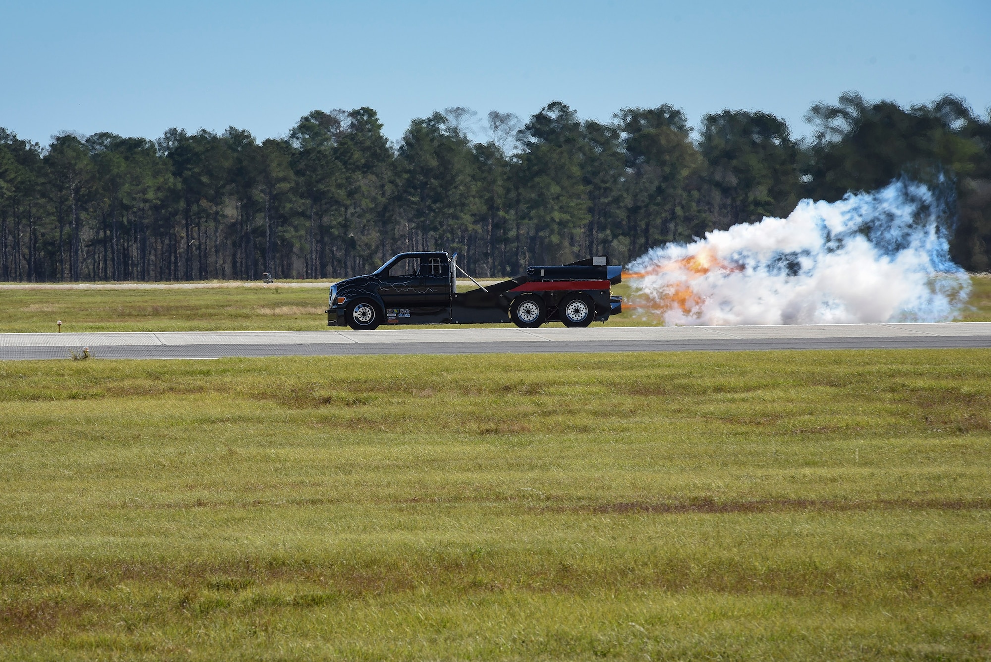 Jet Truck “Homewrecker” speeds down Moody’s flightline during the 2017 Thunder Over South Georgia Air Show, Oct. 28, 2017, at Moody Air Force Base, Ga. The air show aims to educate the public on past and present Air Force aerial capabilities, increase recruiting and show appreciation to the local community. (U.S. Air Force photo by Senior Airman Greg Nash)