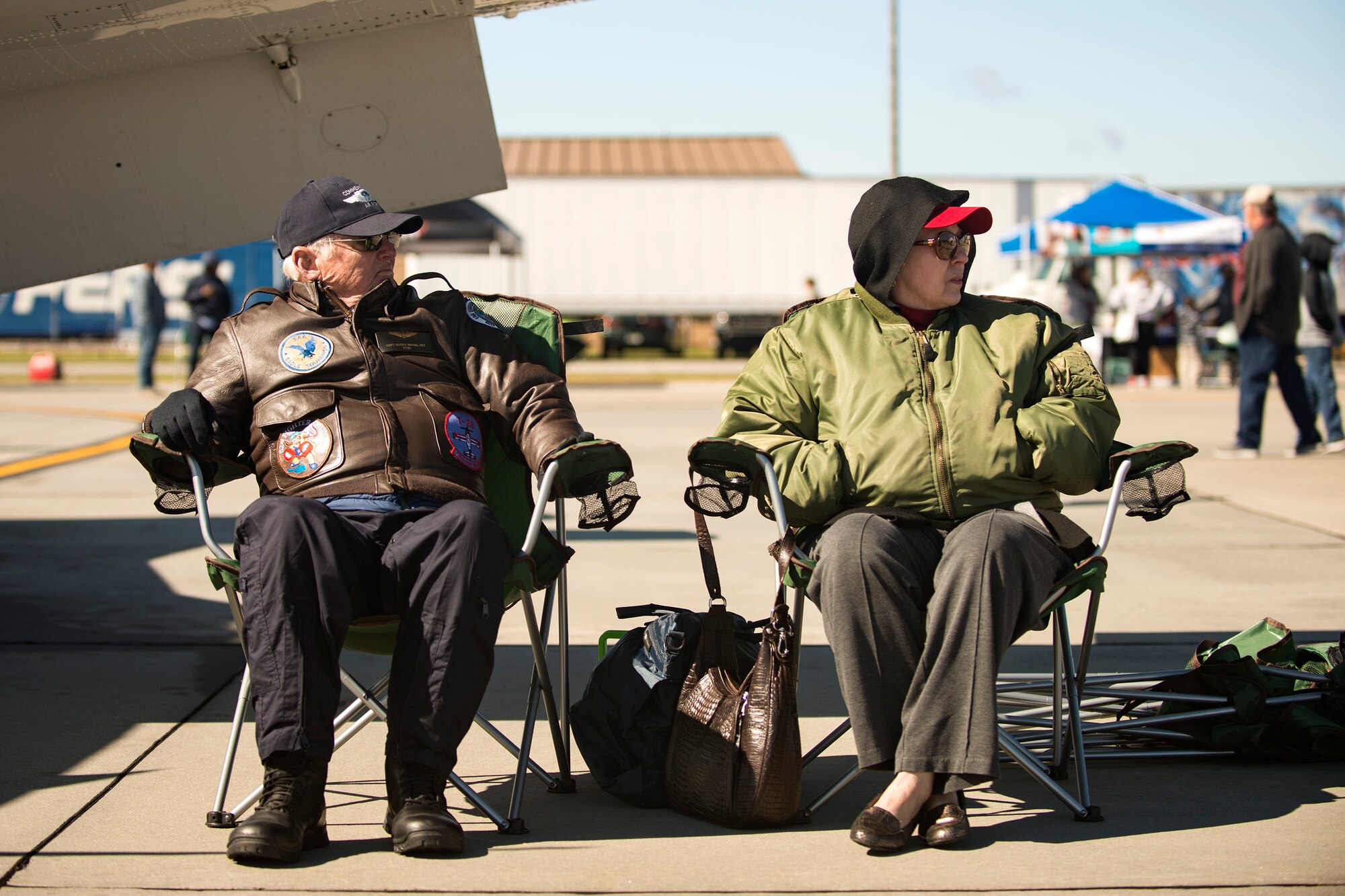 Buddy Bryan, left, and his wife, Charlotte, watch as an aircraft demonstrates its capabilities during the Thunder Over South Georgia Air Show, Oct. 29, 2017, at Moody Air Force Base, Ga. The air show included aerial performances, food, face painting and much more. (U.S. Air Force photo by Airman 1st Class Erick Requadt)