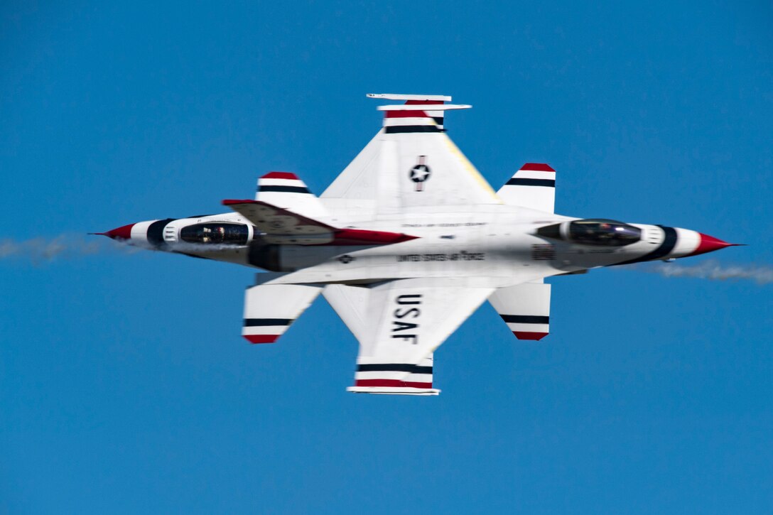 The U.S. Air Force Thunderbirds Flight Demonstration Team soars above Moody Air Force Base during the Thunder Over South Georgia Air Show, Oct. 29, 2017. The Thunderbirds, based out of Nellis Air Force Base, Nev., are the Air Force’s premier aerial demonstration team, performing at air shows and special events worldwide. (U.S. Air Force photo by Senior Airman Daniel Snider)