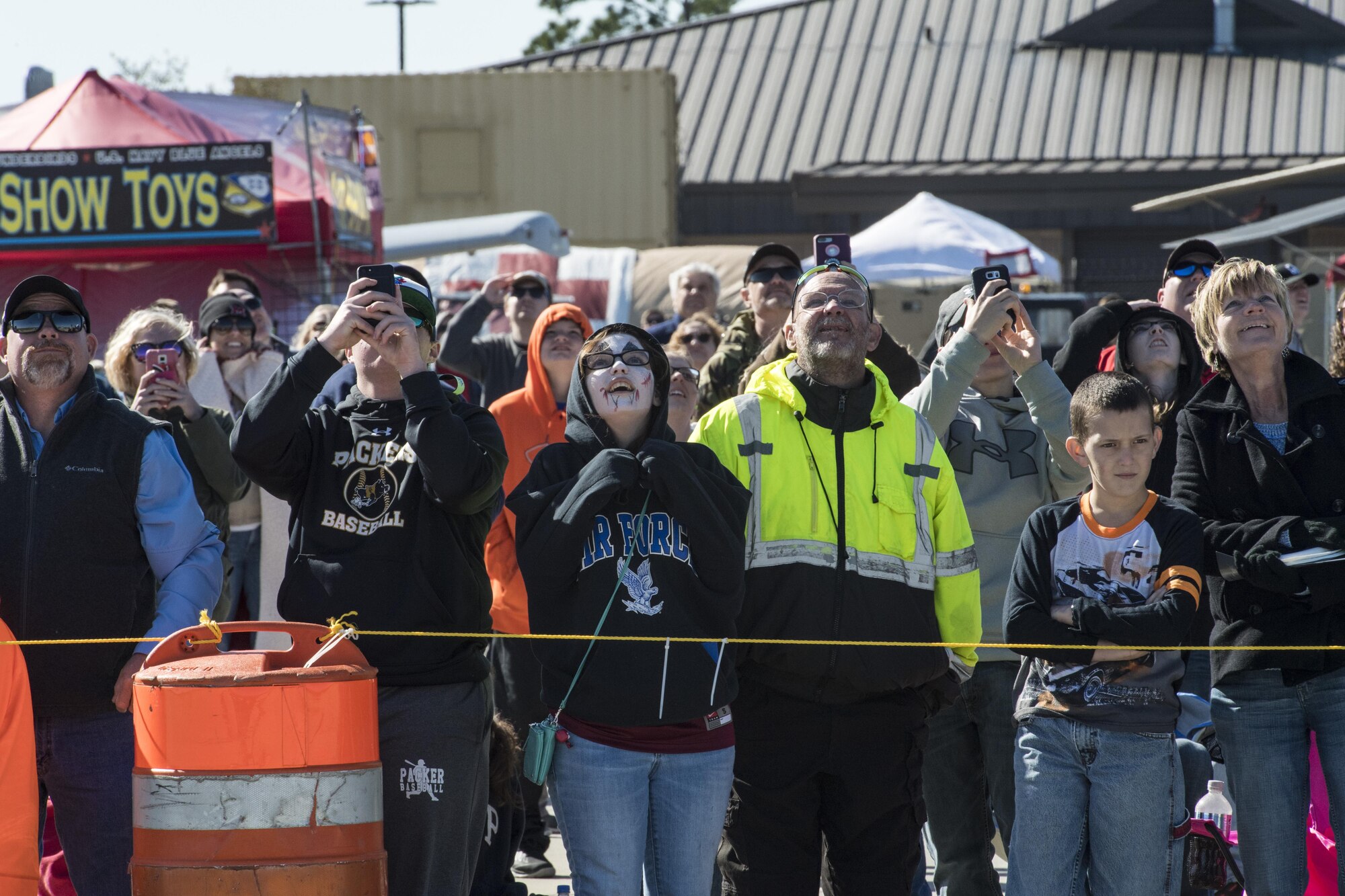 Spectators watch as the U.S. Air Force Thunderbirds perform during the Thunder Over South Georgia Air Show, at Moody Air Force Base, Ga. The air show is an opportunity for Moody to thank the local community for all its support, and exhibit air power. (U.S. Air Force photo by Senior Airman Janiqua Robinson)