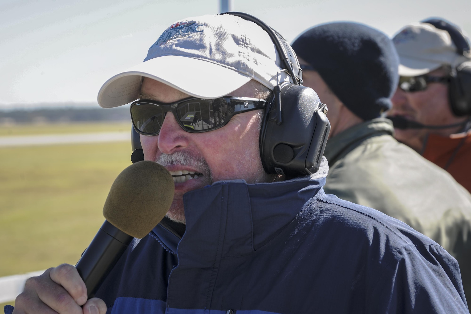 Lee “T.R.” Turner, air show narrator, introduces the U.S. Air Force Thunderbirds during the Thunder Over South Georgia Air Show, Oct. 29, 2017 at Moody Air Force Base, Ga. The Thunderbirds performed twists, turns and rolls at high speeds demonstrating the prowess and capabilities of the F-16 Fighting Falcon. (U.S. Air Force photo by Airman Eugene Oliver)