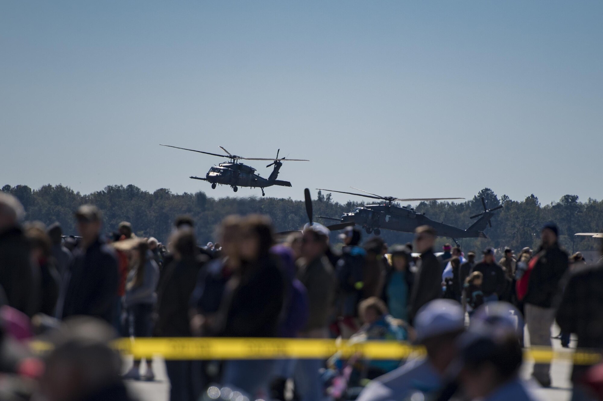 Spectators watch in awe as an HH-60G Pavehawk land during the Thunder Over South Georgia Air Show, Oct. 29, 2017, at Moody Air Force Base, Ga. The open house is an opportunity for Moody to thank the local community for all its support, and exhibit air power. (U.S. Air Force photo by Staff Sgt, Eric Summers Jr.)