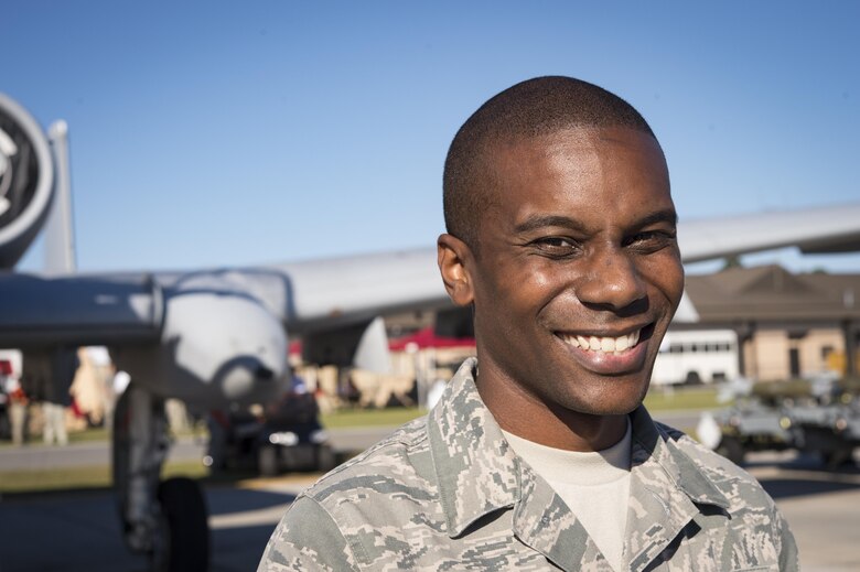 Staff Sgt. Tayrell Washington, 23d Maintenance Group, perform a weapons load demonstration in front of a crowd of spectators, during Thunder Over South Georgia, Oct. 28, 2017, at Moody Air Force Base, Ga. In addition to aerial events, the air show also provided a unique opportunity to educate the public on past and present Air Force capabilities, increase recruiting and show appreciation to the local community. (U.S. Air Force photo by Andrea Jenkins)
