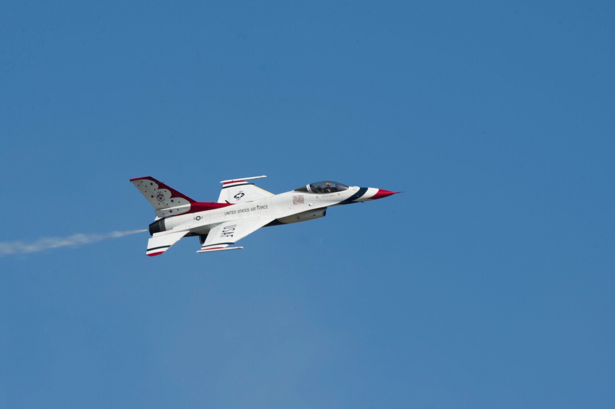 A member of the U.S. Air Force Thunderbirds Flight Demonstration Team aviates during the Thunder Over South Georgia Air Show, Oct. 29, 2017, at Moody Air Force Base, Ga. The Thunderbirds performed twists, turns and rolls at high speeds demonstrating the prowess and capabilities of the F-16 Fighting Falcon. (U.S. Air Force photo by Senior Airman Greg Nash)