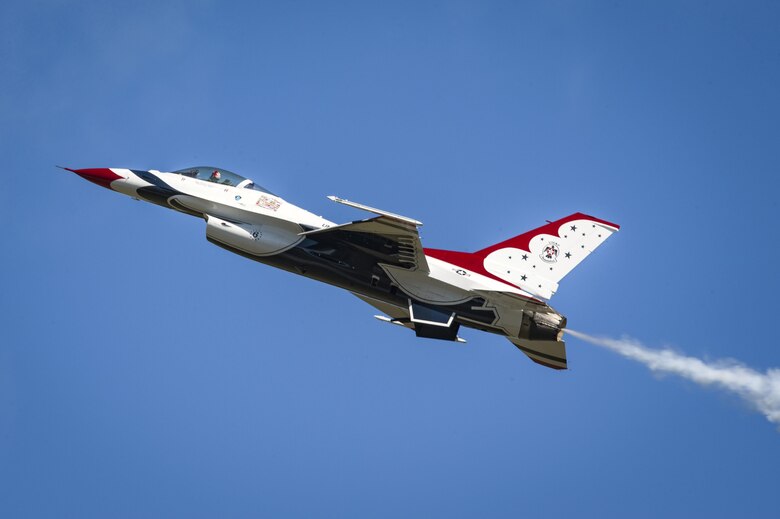 A member of the U.S. Air Force Thunderbirds Flight Demonstration Team soars above 11,000 spectators during the 2017 Thunder Over South Georgia Air Show, Oct. 29, 2017, at Moody Air Force Base, Ga. In addition to aerial performances by military and civilian pilots, attendees viewed aircraft through the ages perform such as the P-51 mustang, a World War II fighter, and Moody’s own A-10C Thunderbolt IIs, HH-60 G Pave Hawks and HC-130J Combat King IIs. (U.S. Air Force photo by Senior Airman Greg Nash)