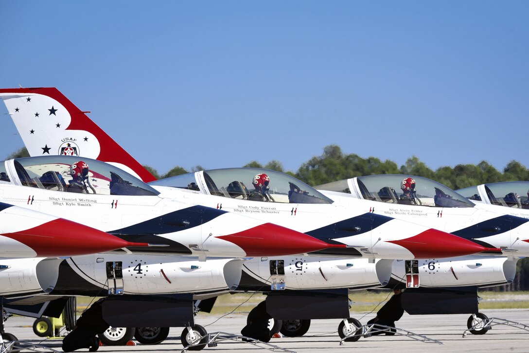 Members of the U.S. Air Force Thunderbirds Flight Demonstration Team prepare to launch for the 2017 Thunder Over South Georgia Air Show, Oct. 29, at Moody Air Force Base, Ga. The mission of the Thunderbirds is to plan and present precision aerial maneuvers to exhibit the capabilities of modern high performance aircraft and the high degree of professional skill required to operate such aircraft. (U.S. Air Force photo by Senior Airman Greg Nash)