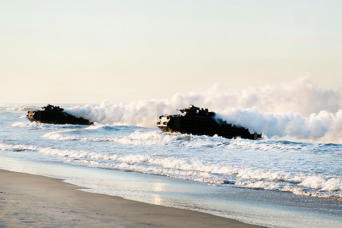 Amphibious assault vehicles from the Japanese Maritime Self-Defense Force approach Red Beach during bilateral exercise Dawn Blitz 2017.