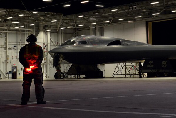 A 509th Bomb Wing crew chief waits to marshall a B-2 spirit to the runway at Whiteman Air Force Base, Mo., Oct. 28, 2017. The B-2 conducted a long-range mission to the U.S. Pacific Command area of responsibility this weekend.  These missions validate our always-ready global strike capability and are a visible demonstration of commitment to our allies and enhancing regional security.