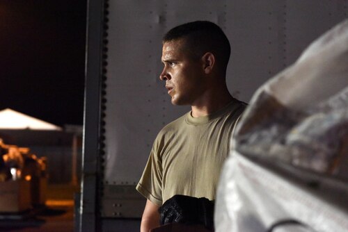 Aerial Port Airmen from Alaska's Air National Guard's 176th Airlift Wing, Connecticut ANG's 103rd Airlift Wing and the Puerto Rico ANG's 156th Airlift Wing work together to load 18 pallets of U.S. mail on trucks for the United States Postal Service at Muñiz Air National Guard Base, Puerto Rico, Oct. 20. Power outages and a large influx of care packages and relief items from around the world have quadrupled the average volume of mail destined to the Caribbean island still in recovery from Hurricane Maria. (U.S. Air National Guard photo by Staff Sgt. Angel Oquendo)