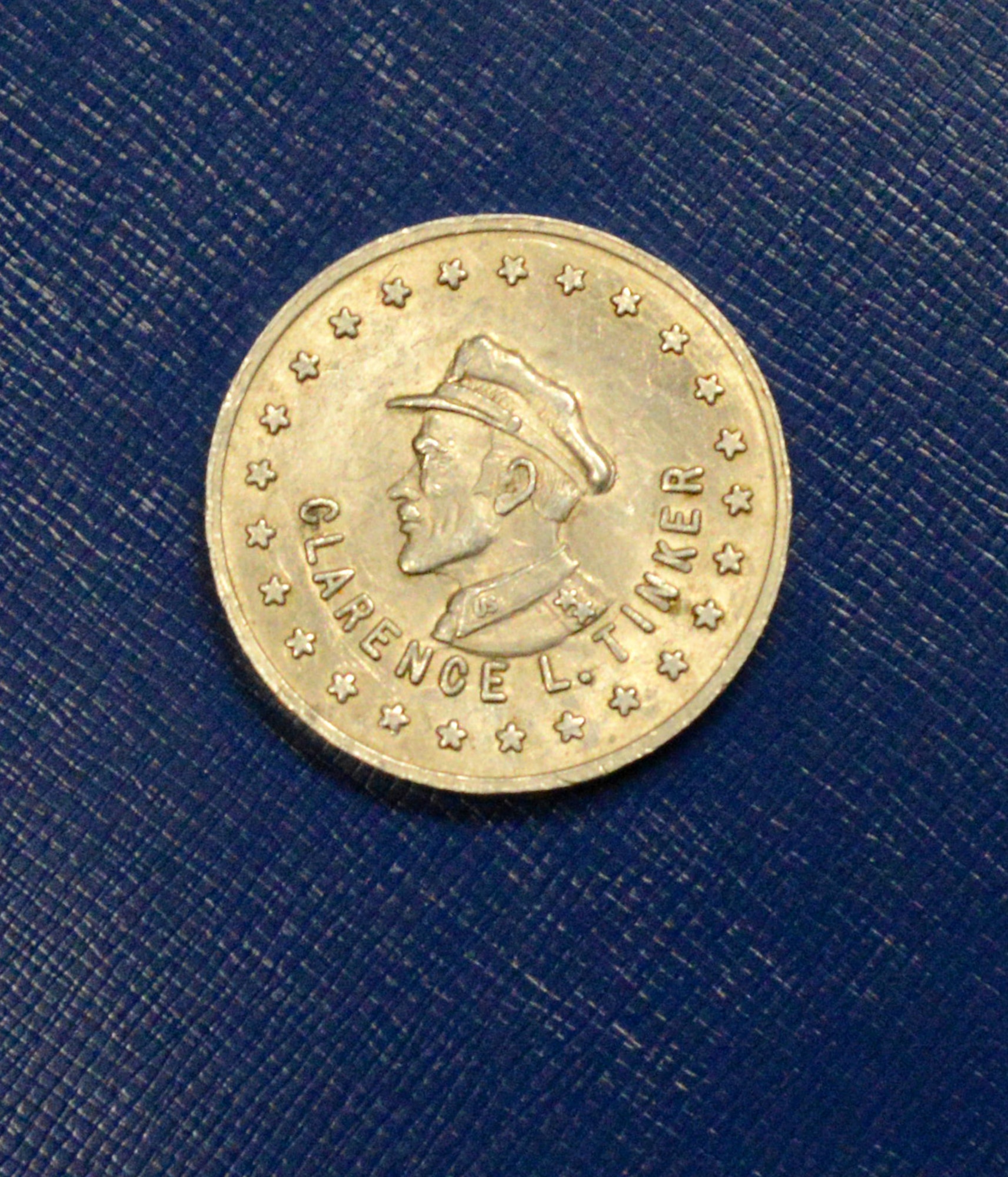 A coin from Tinker’s 25th Silver Anniversary. The front is a silhouette of Maj. Gen. Clarence Tinker and the back is Tinker’s emblem with the years of operational service, 1942 to 1967, at the time the coin was made.