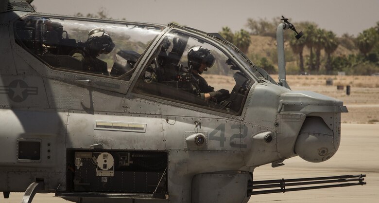 U.S. Marine Corps Maj. Jasmin Moghbeli, a pilot assigned to Marine Test and Evaluation Squadron (VMX) 1, conducts her final flight in an AH-1 "Cobra" at Marine Corps Air Station Yuma, Ariz., June 7, 2017. Maj. Moghbeli will report to the Johnson Space Center in Houston, Texas, later this year to attend the NASA Astronaut Candidate Class of 2017. (U.S. Marine Corps photo taken by Lance Cpl. Christian Cachola)
