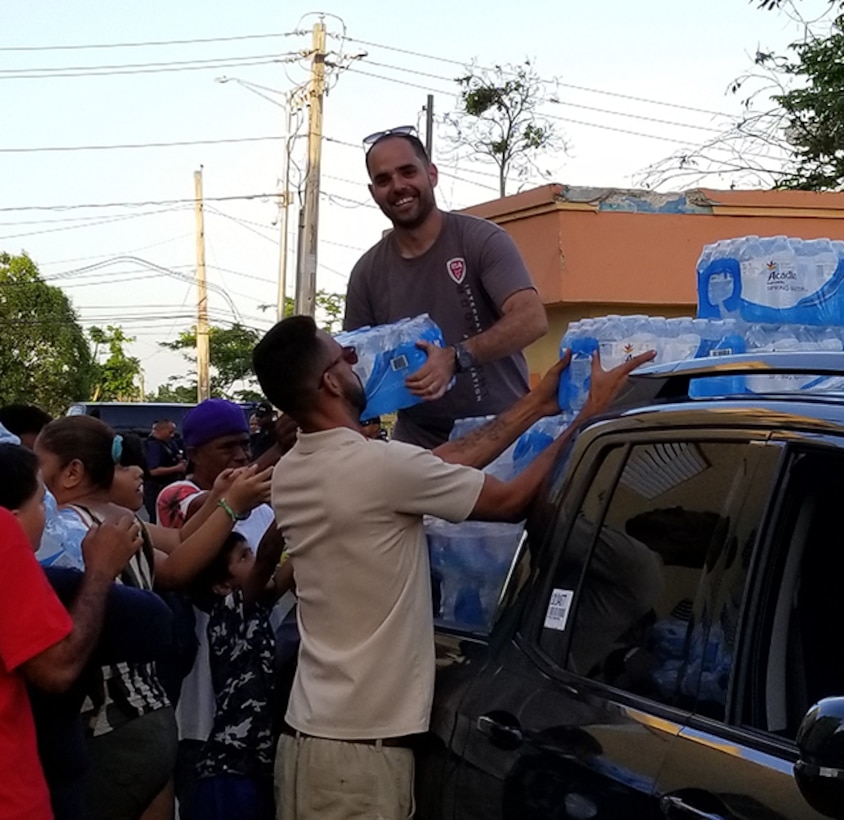 Defense Contract Management Agency Los Angeles employee Efrain Vega De Varona, who is a quality engineer, has distributed food and water in Puerto Rico to help with the Hurricane Maria relief efforts. He is from San Juan, Puerto Rico. (Courtesy photo by Efrain Vega De Varona)