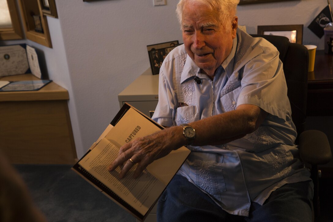 Peter B. Marshall, a World War II prisoner of war, shares his experience of spending 1,368 days behind enemy lines. Marshall is the last World War II POW, captured from Guam, still alive. (U.S. Marine Corps photo taken by Lance Cpl. Hanna Powell)