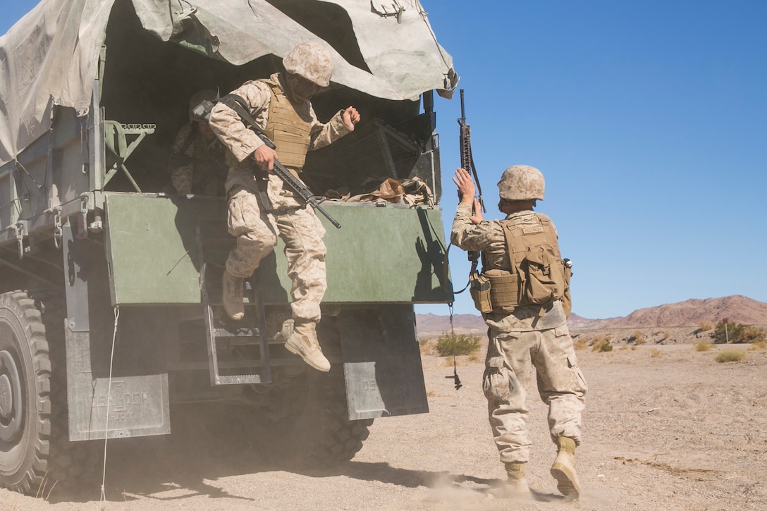 Marines with Combat Logistics Battalion 5, which is based out of Marine Corps Base Camp Pendleton, Calif., conduct a training exercise at Range 114 aboard the Marine Corps Air Ground Combat Center, Twentynine Palms, Calif., Oct. 21, 2017. CLB-5’s training, which was part of Integrated Training Exercise 1-18, was focused on using compact metal detectors to detect improvised explosive devices, evacuating personnel from a vehicle that had been struck by an IED and moving a convoy through a kill zone after receiving contact. (U.S. Marine Corps photo by Lance Cpl. Isaac Cantrell)