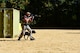 U.S. Marine Corps Cpl. Daniel Barker, 2nd Law Enforcement Battalion military working dog handler, and Marsh, 2nd LEB specialized search dog, engage a simulated threat during the East Coast Iron Dog competition, Oct. 25, 2017, at Seymour Johnson Air Force Base, North Carolina. After engaging the threat with simulated gunfire, the team entered a house and arrested a hostile suspect. (U.S. Air Force photo by Airman 1st Class Kenneth Boyton)