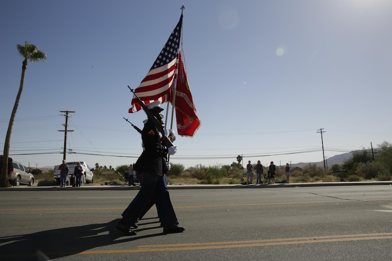 The Headquarters Battalion Color Guard marches during the annual Pioneer Days Parade in Twentynine Palms, Calif., Oct. 21, 2017. Pioneer Days recognizes those who settled in the area and developed the community as it is today. (U.S. Marine Corps photo by Pfc. Rachel K. Young)
