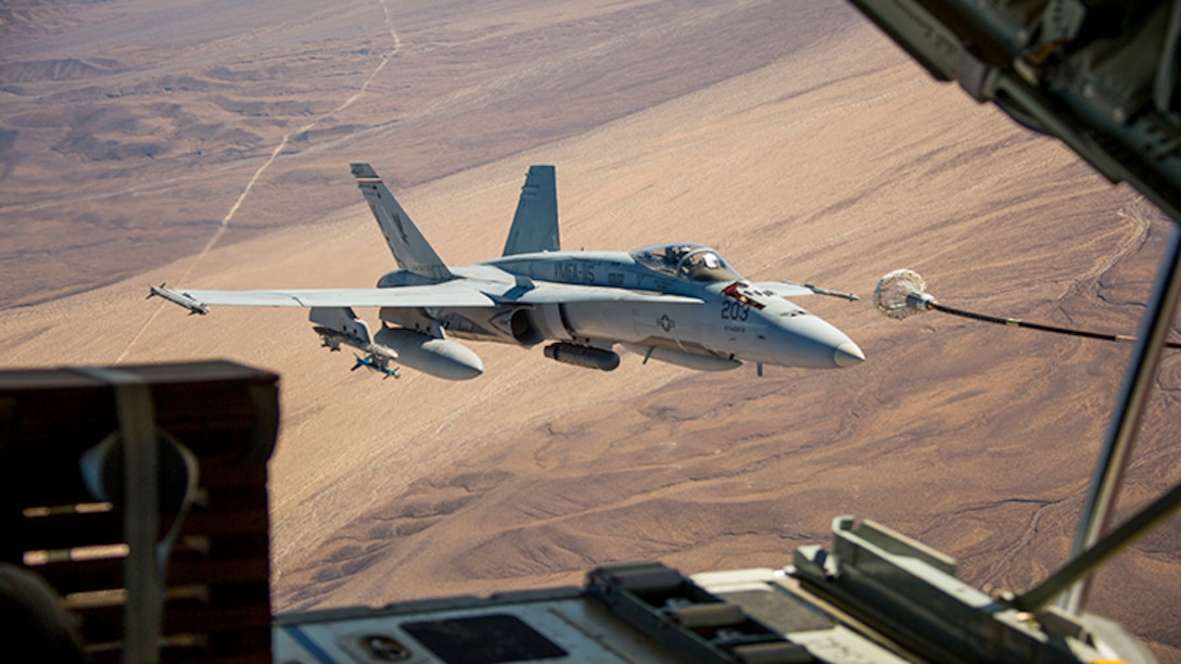 An F/A-18C Hornet assigned to Marine Fighter Attack Squadron 115 conducts aerial refueling during Integrated Training Exercise (ITX) 1-18 over Marine Corps Air Ground Combat Center, Twentynine Palms, Calif., Oct. 28, 2017. ITX is a large-scale, combined-arms training exercise intended to produce combat-ready forces capable of operating as an integrated Marine Air Ground Task Force.