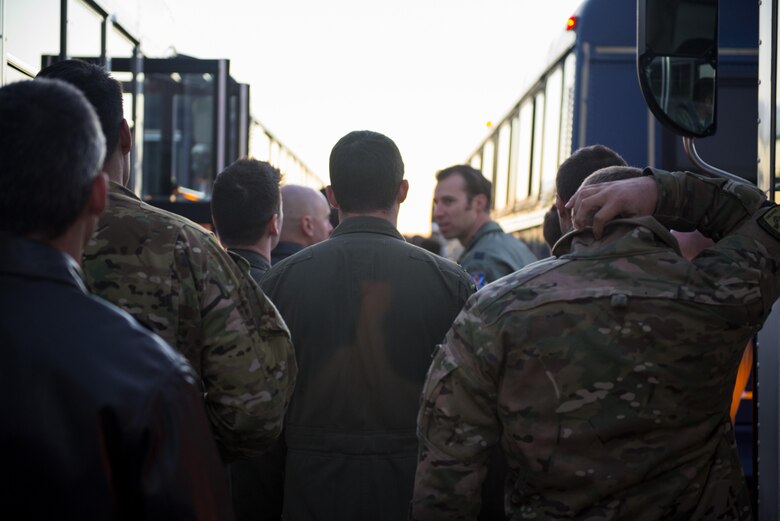 Airmen board the buses used during a foreign object debris (FOD) walk, Oct. 30, 2017, at Moody Air Force Base, Ga. The FOD walk was performed following the Thunder Over South Georgia Air Show, to remove any debris that could potentially cause damage to aircraft or vehicles. (U.S. Air Force photo by Airman 1st Class Erick Requadt)