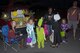 Costumed children gather for treats during the Trunk or Treat event at Duke Field, Fla