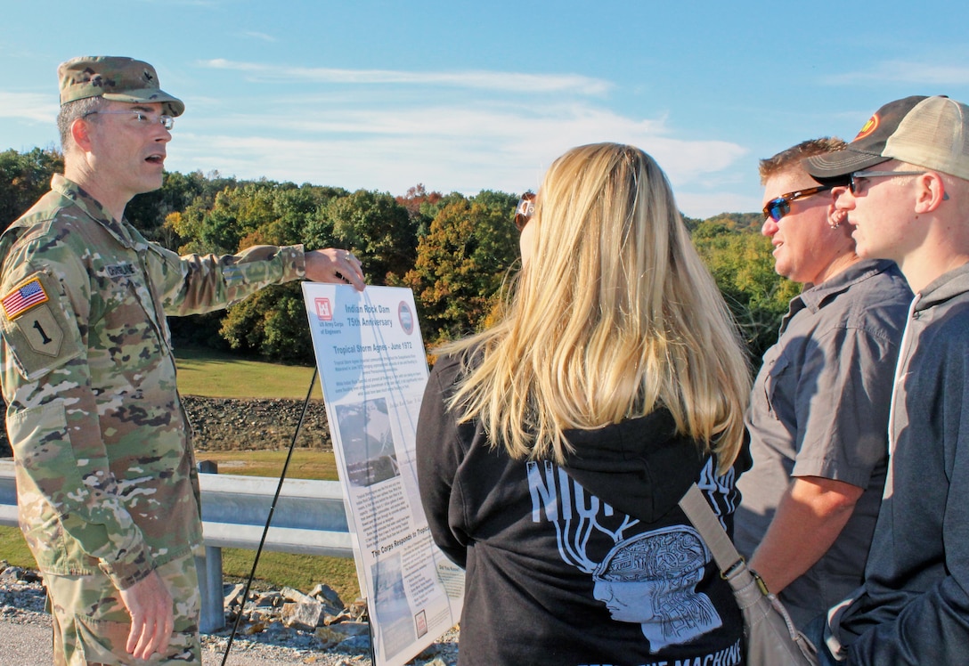 U.S. Army Corps of Engineers, Baltimore District, Commander Col. Ed Chamberlayne talks about the history of Indian Rock Dam with area community members atop the dam during an open house to commemorate the dam's 75th anniversary Saturday October 28, 2017. Several hundred people visited the dam to learn about its years of reducing flood risks to downstream communities and partake in the unique opportunity to see the inside of its gatehouse.