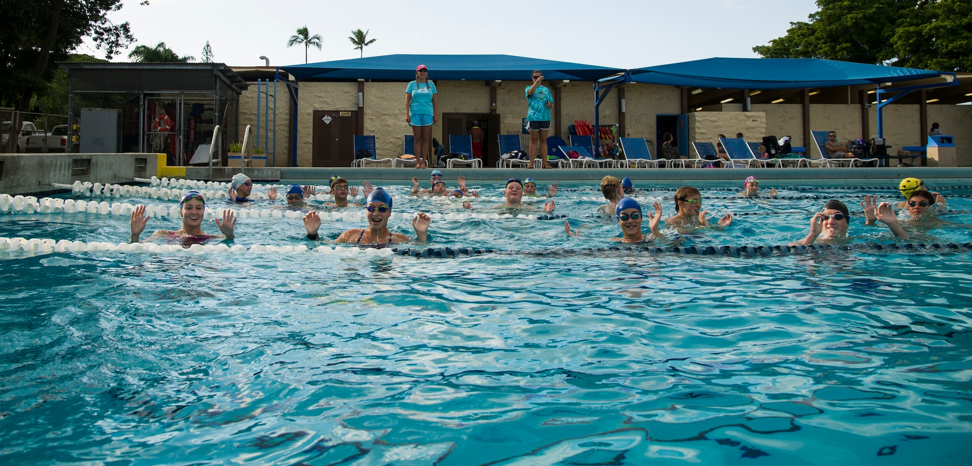 Members of the Hickam Hurricanes practice treading water at Scott Pool on Joint Base Pearl Harbor-Hickam, Hawaii, Oct. 24, 2017. The Hickam Hurricanes is a student club that develops skills for local, state, national and international levels of competitive swimming in accordance with the rules of U.S.A. Swimming, Inc. (U.S. Air Force photo by Tech. Sgt. Heather Redman)