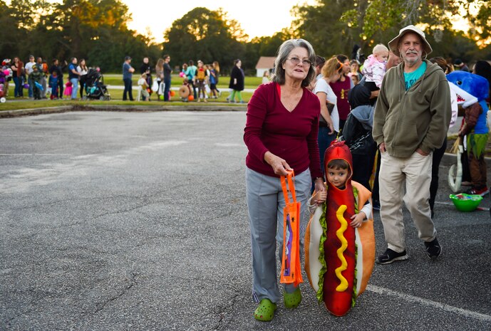 Fall Fest attendees stand in line to trunk-or-treat outside the library at Joint Base Charleston, S.C., Oct. 27, 2017.