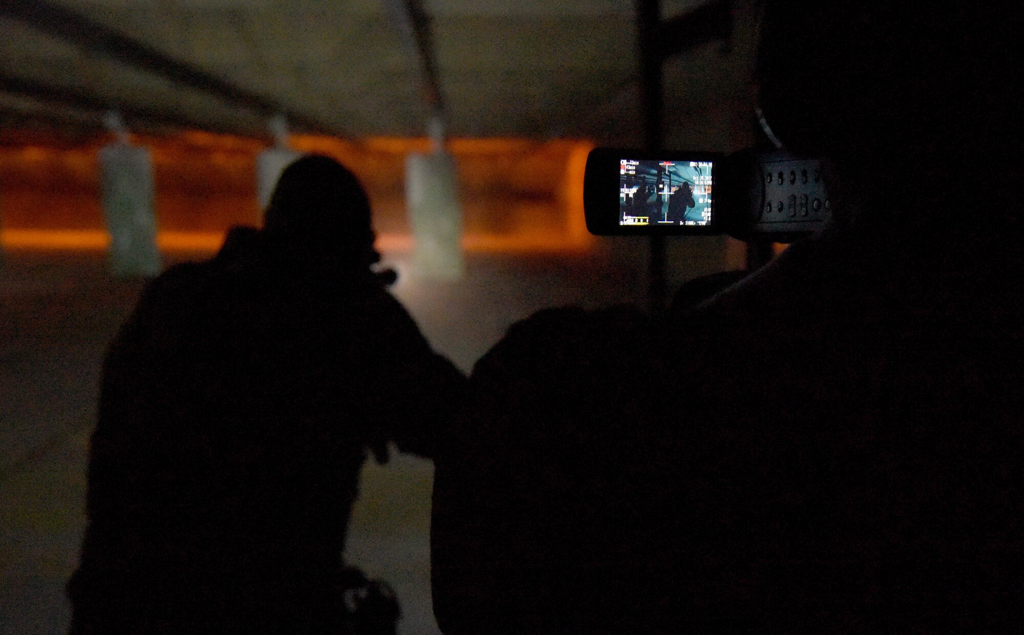 Reporters from local media outlets tour the 81st Security Forces Squadron indoor firing range during Media Day Oct. 26, 2017, on Keesler Air Force Base, Mississippi. In order to better understand Keesler’s mission, the reporters also toured the air traffic control tower, the Keesler Medical Center and a 333rd Training Squadron cyber training course. (U.S. Air Force photo by Kemberly Groue)