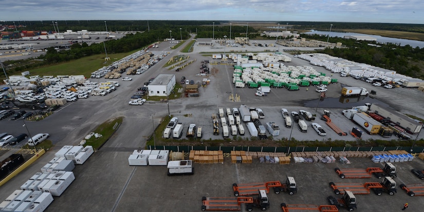 Generators, vehicles, temporary living facilities and others sit waiting to be loaded onto Military Sealift Command’s USNS Brittin at Joint Base Charleston Naval Weapons Station, S.C., Oct. 28, 2017.