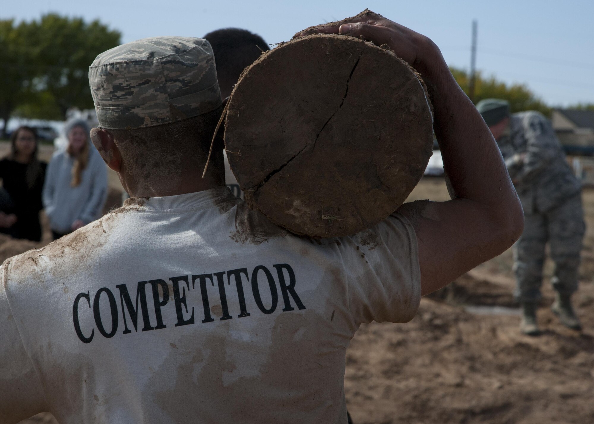 Members of the 377th Weapons Systems Security Squadron carry a log during the “Team Punisher” portion of the Manzano Challenge at Kirtland Air Force Base, N.M., Oct. 27. The competition featured Airmen from across the 377th Security Forces Group divided into teams of four to compete on 13 stations. (U.S. Air Force photo by Staff Sgt. J.D. Strong II)
