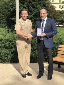 Mr. Tony Haag was awarded the Navy Superior Civilian Service Award on Oct. 26 2017 in a formal ceremony in Washington D.C. Pictured with Haag is CAPT Joel Davis, OPNAV N2N6F33.